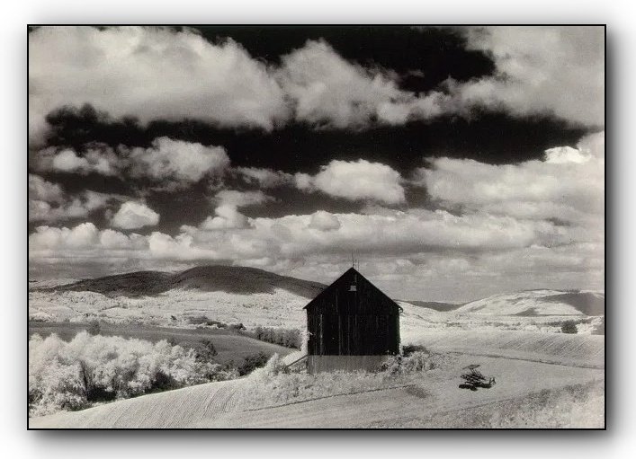 172. Minor White - La Teoria dell'Equivalenza 16 11.white barn and clouds Minor White Photo