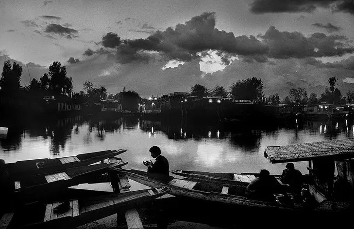 38.The essence of India Prayer at Dal Lake Srinagar1995. Raghu Rai